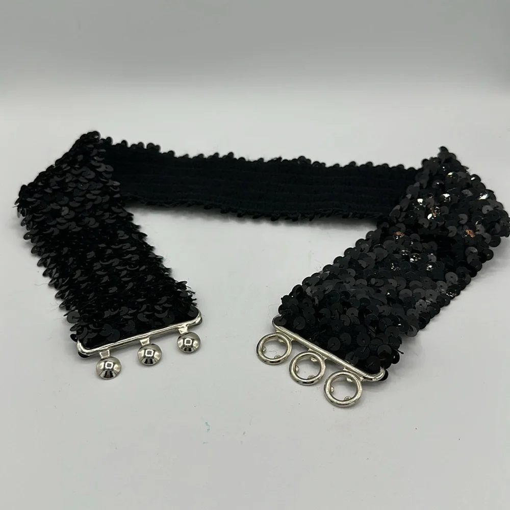 Black sequin stretch belt with silver metallic closure, size S